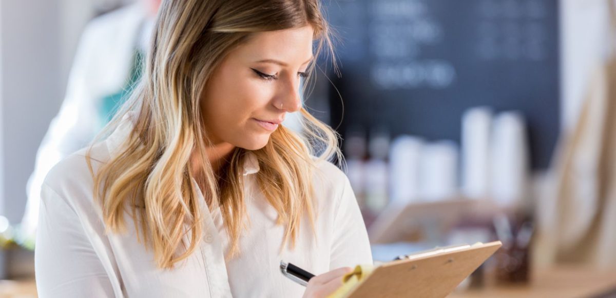 Woman with clipboard.