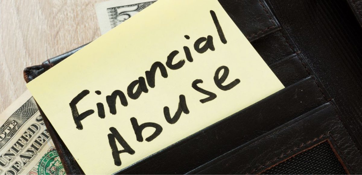 Post it note reading 'financial abuse'.