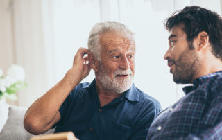 Older father talks to adult son