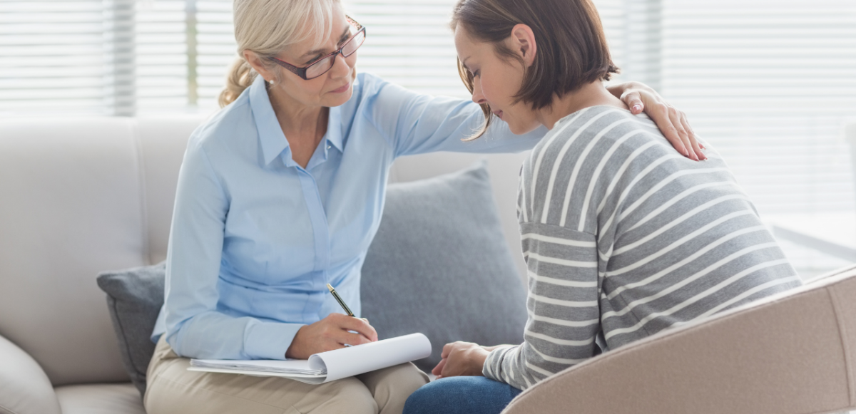 Therapist comforting client